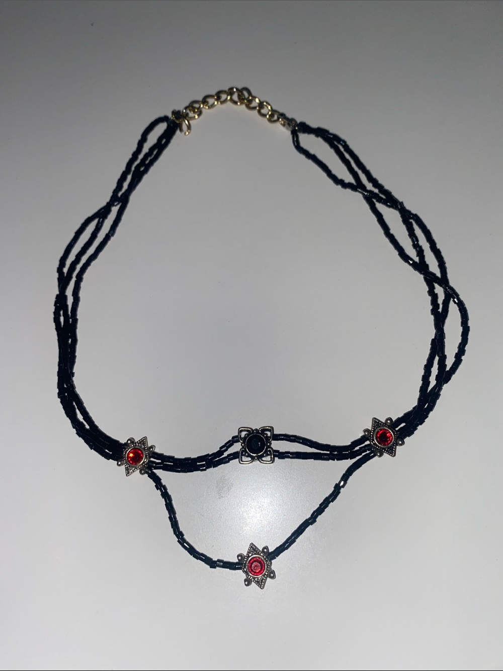 Delicate Black Beaded Layered Necklace with Red Accents